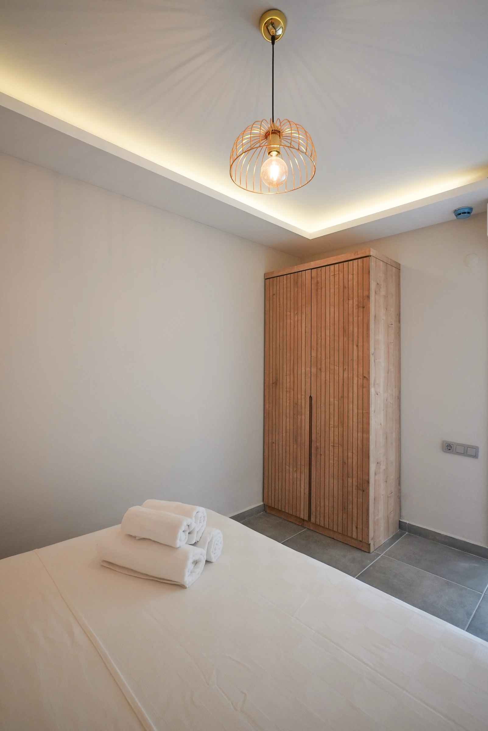 Representative warm, minimal guest room at Soul House